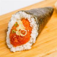 Spicy Tuna Hand Roll · Spicy chopped tuna (raw), sesame, and scallions.
