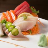 Sashimi Deluxe  · 18 pieces. Assorted raw fish.