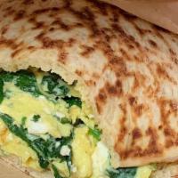 Varda'S Popeye · Loads of spinach and herbs with scrambled eggs and feta cheese stuffed in pita.