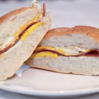 Bacon, Egg & Cheese Sandwich · Add egg, cheese, meat or hash brown for an additional charge.