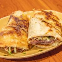 House Pancake Beef Rolls · Fried thin crispy pancake rolled with marinated beef, cucumbers and salty sweet sauce.