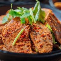 Beef In Chili Sauce · Marinated boiled beef, sliced and seasoned with salt, chili powder, Chinese celery and cilan...