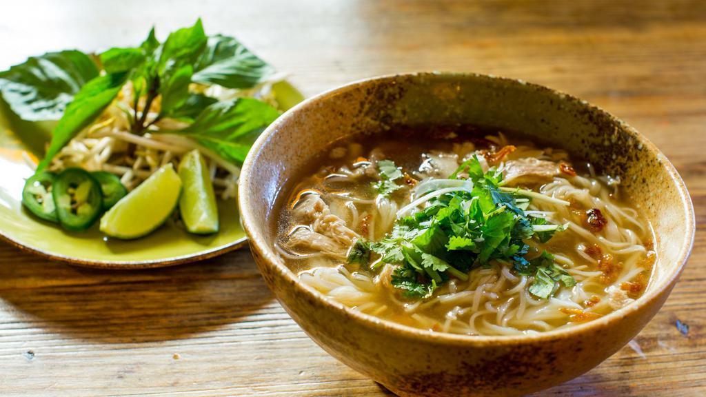 Pho Ga · 24 hour simmered chicken broth, rice noodles, shredded chicken, bean sprouts, mint, Thai basil, cilantro, scallion, crispy shallots (gluten free without lemongrass sate)