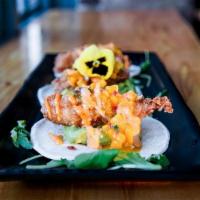 Crunchy Fish Tacos · Panko crusted wild cod with Thai Cole Slaw, Avocado crema and mango salsa. Served in a fresh...