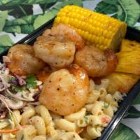 Garlic Shrimp Dinner · Jumbo shrimp tossed with garlic butter and spices, roast veggies, mac salad, and Coleslaw.