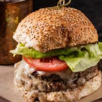 Bowery Burger · grass-fed beef, white cheddar cheese, lettuce, tomato, onions, pickle, special sauce.  Serve...