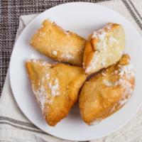 Zeppoles (4) · Crispy on the outside, yet light and fluffy on the inside. These mini Italian donut holes wi...