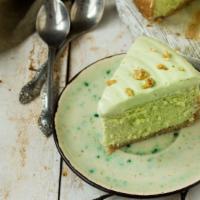 Ricotta Pistachio Cake · Light and airy sponge cake layered with creamy ricotta and pistachio pieces. Topped with a d...