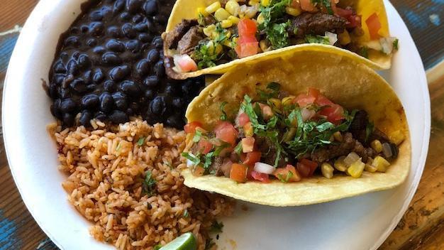 Grass-Fed Braised Beef Taco Plate · Comes with your choice of rice and beans on the side.