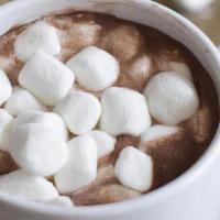Hot Chocolate · Dark chocolate steamed with your choice of milk.