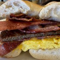 The Belly Buster · 2 Eggs, Bacon, Sausage, Pork Roll & Cheese Served on Your Choice of Bread.