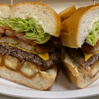 The Big Mama · Cheeseburger, chicken tenders, mozzarella sticks, lettuce, tomato, ketchup, mayo & french fr...