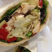 The Balsamic Chicken Wrap · Grilled chicken, roasted red peppers, fresh mozzarella cheese, spinach and our tangy balsami...