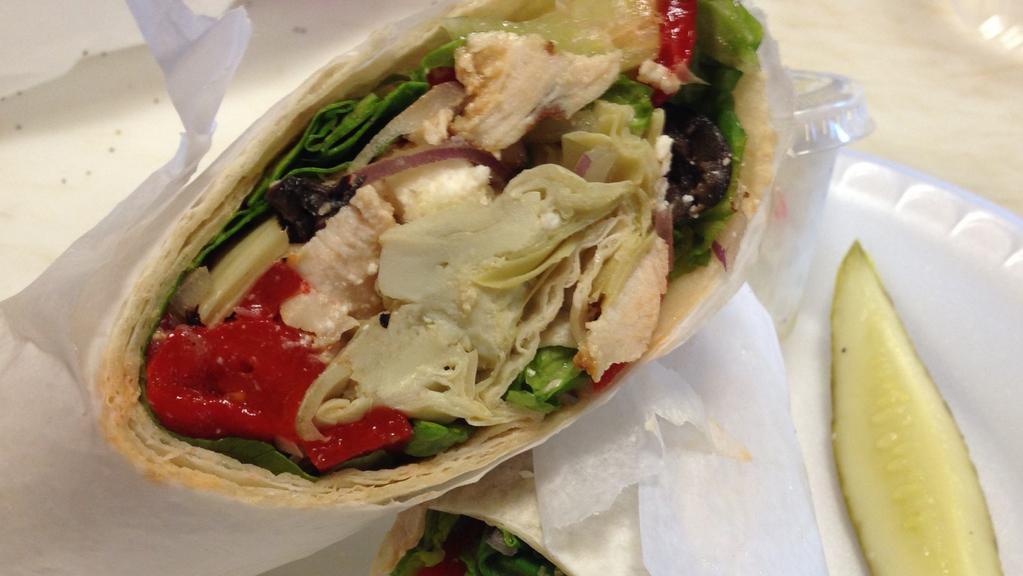 The Balsamic Chicken Wrap · Grilled chicken, roasted red peppers, fresh mozzarella cheese, spinach and our tangy balsamic vinaigrette glaze.
