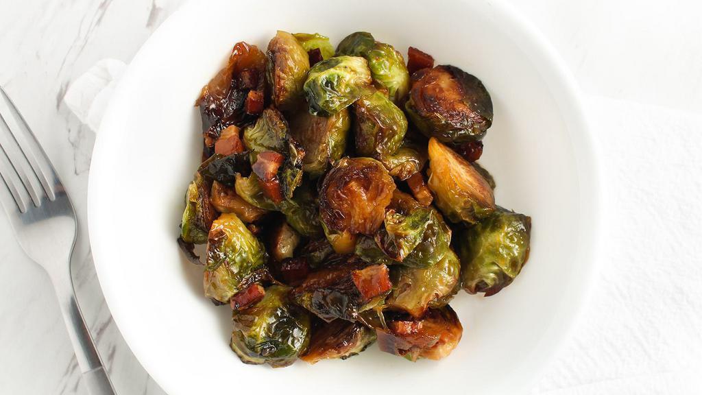 Brussels Sprouts · Bacon, caramelized onions.