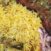Chicken Biryani · Flavorful long-grain basmati rice cooked in layers of meat and spices.