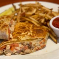 American Cuban · Grilled chicken, onion, tomato, cheddar cheese and spicy ranch dressing rolled in a grilled ...
