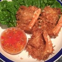 Coconut Shrimp · Four pieces. Deep fried shrimp in a coconut and panko batter. Served with sweet and sour sau...