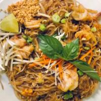 Pad Thai · Stir fried rice noodles with egg, tofu bean sprouts, and scallion in a tamarind sauce topped...