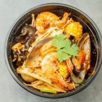 Mini- Hot Pot (Seafood) · Shrimp, fish, fish ball, veg. , potato, glass noodles, comes with rice.