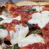 Margherita Pizza  · Tomato sauce, fresh mozzarella, fresh basil, extra virgin olive oil.