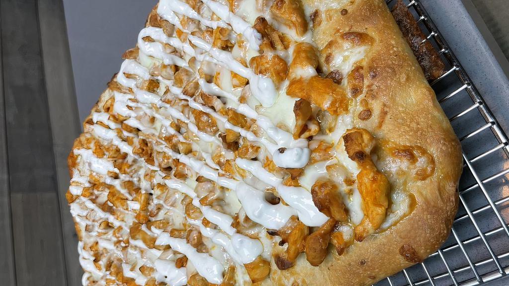 Buffalo Chicken Pizza · Spicy chicken, mozzarella, topped with ranch or blue cheese.