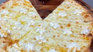 Bianca - (White Pizza)  · Ricotta, mozzarella, extra virgin olive oil.
