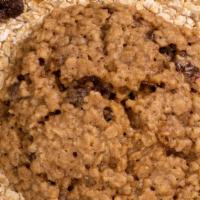 Oatmeal Raisin · A chewy center with crispy edges, packed with cinnamon notes, raisins and rolled oats.