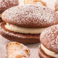 Chocolate Cannoli Whoopie Pie · rich and fluffy chocolate whoopie pie cookies filled with a traditional cannoli cream filling