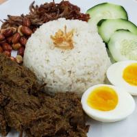 Lemak Rice With Beef Rendang · Coconut infused jasmine rice served with flavorful Malaysian beef rendang, roasted peanuts, ...