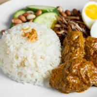 Lemak Rice With Chicken Curry · Coconut infused jasmine rice served with flavorful Malaysian chicken curry, roasted peanuts,...