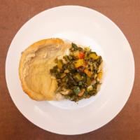 Callaloo & Saltfish · Jamaican vegetable & saltfish seasoned and cooked to a succulent taste, then wrapped in a lo...