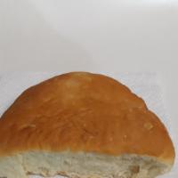 Freshly Baked Coco Bread · Try a Jamaican patty wrapped into a soft, buttery coco bread. (1 piece)