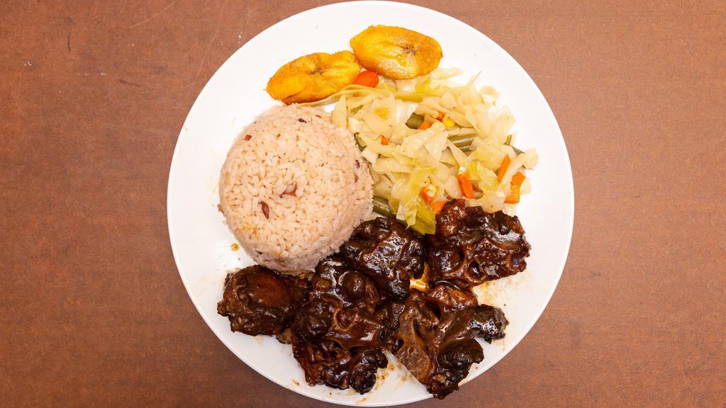 Oxtail · Tender braised oxtails, taste of the Island.