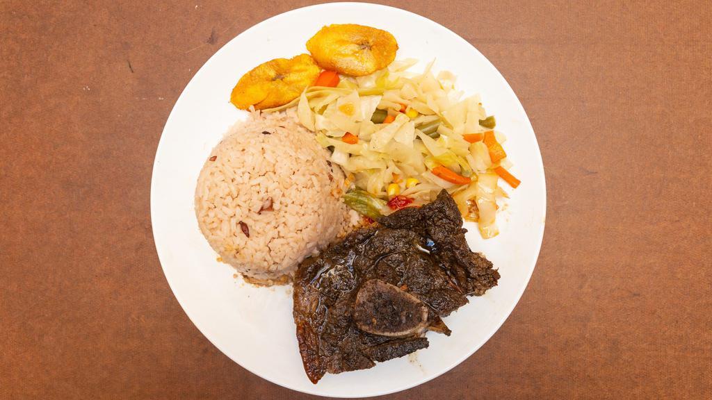 Jerk Pork · Pork marinated in Jamaican jerk seasoning and slowly Jerk.