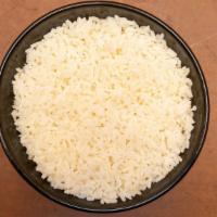 White Rice · The perfect side dish for our curry, oxtails, and jerk dishes.