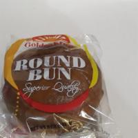 Round Bun · Soft, Dense, Spiced Bun with Raisins. Perfect for a snack or dessert
