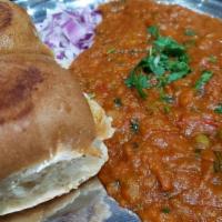 Pav Bhaji · Mixed vegetables cooked in tomato gravy with onions, garlic, ginger and served with Indian s...