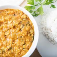 Kootu · Vegan. Lentil mixed in special vegetable of the day. South Indian style. Served with basmati...