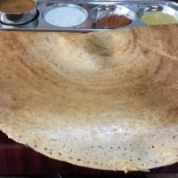 Masala Dosa · Light, crispy, sour-dough crepe made from rice lentil with potato filling. Served with samba...