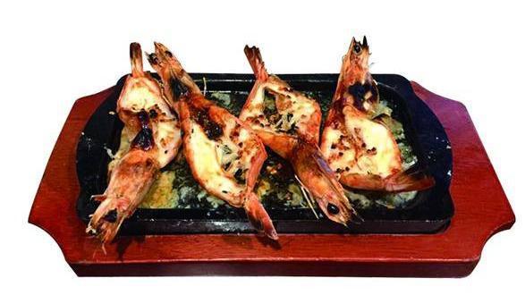 Tiger Shrimp · 3 pieces of grilled Tiger shrimp marinated in garlic and ogam special house sauce.