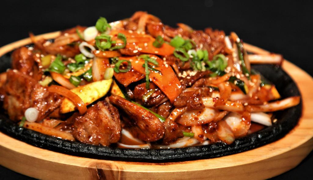 Jae Yook Bokum · Spicy marinated berkshire pork loin stir-fried on a sizzling pan.