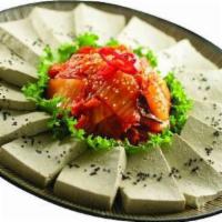 Jae Yook Tofu Kimchi Bokum · Kimchi stir fried with berkshire pork and served with tofu. Include. asparagus, brussel spro...