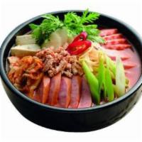 Budae Jjigae Soup · Army stew soup with kimchi, sausage, ham, Berkshire pork belly, tofu, rice cake, and ramen.