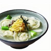 Ddukmandoo Gook Soup · Homemade beef and pork dumplings and rice cake in a beef broth soup.