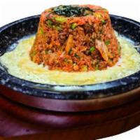 Dol Pan Kimchi Bokum Bap · Chef''s choice. Kimchi fried rice with choice of protein. Comes on a sizzling stone pan with...