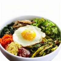 Bi Bim Bap · A medley of vegetables with a special house sauce and fried egg in a regular bowl with your ...