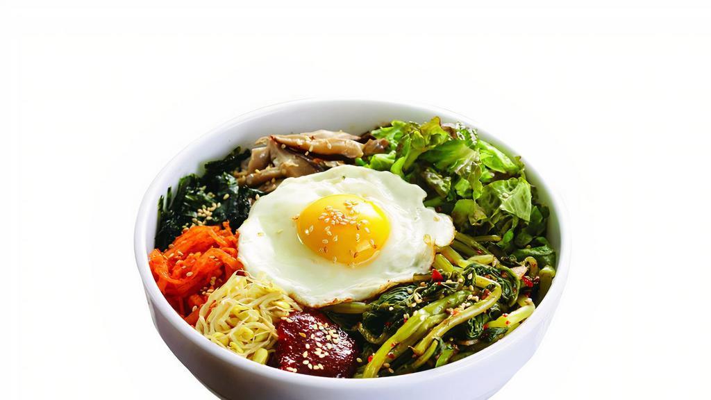 Bi Bim Bap · A medley of vegetables with a special house sauce and fried egg in a regular bowl with your choice of style.