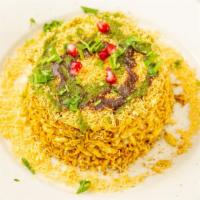 Bombay Bhel Puri · Puffed rice flakes tossed with onions, potatoes, tomatoes, cilantro and tamarind chutney, sp...