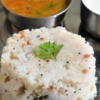 Upma · Semolina and lentils with ginger, onions and curry leaves, served with sambar and coconut ch...